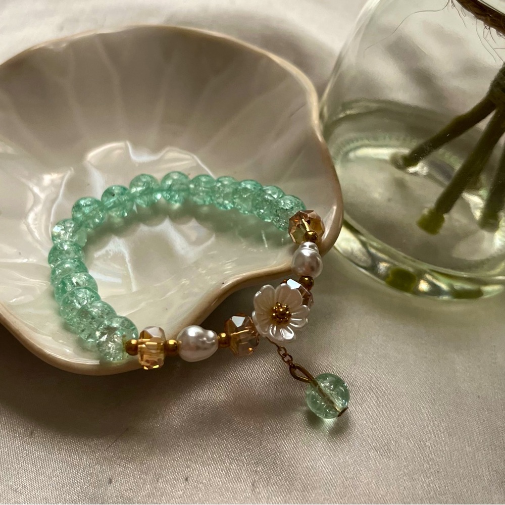 Handmade Beaded Bracelet with Floral Charm